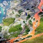 Thủ phạm khiến hàng loạt sông suối Alaska chuyển màu cam