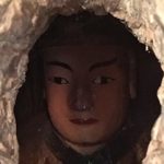Trung Quốc: Đầu tượng Phật lộ ra từ thân cây 1.000 tuổi